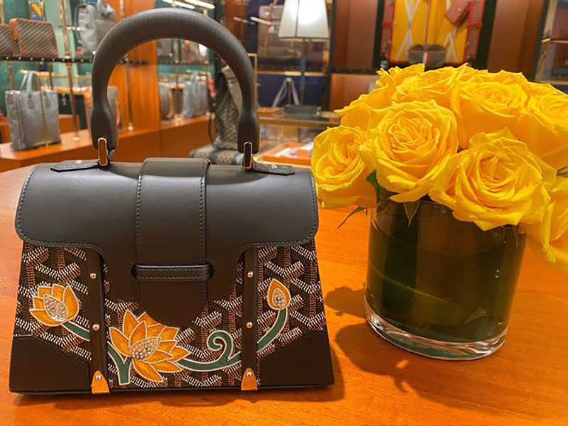 Túi goyard màu đen hình hoa vàng